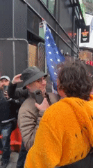 Rainbow flag march draws crowds, heated exchanges in NYC