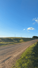 Rural road landscape documented in Batmany, Russia