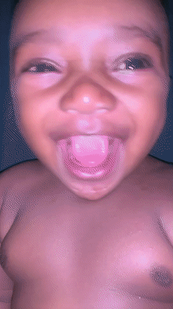 Smiling baby photographed in Barakin Akawo, Nigeria