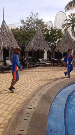 Poolside dance performance with DJ setup captured at Porlamar resort