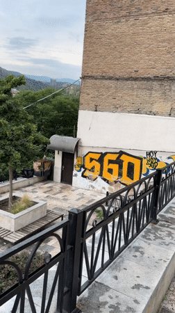 Wandering Tbilisi's streets, old buildings, and a bread stall