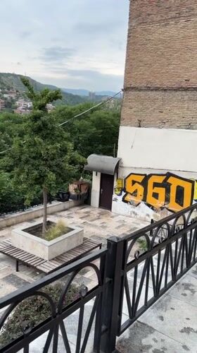 Wandering Tbilisi's streets, old buildings, and a bread stall