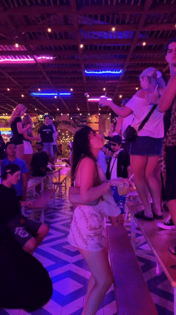 Neon-lit club night in full swing, North Kuta, Bali