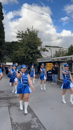 Marching bands parade through Budva streets in colorful uniforms