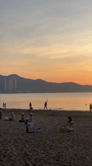Sunset yoga and swimming witnessed at Nha Trang beach