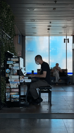 Keyboard music and a decorated building facade in Tel Aviv