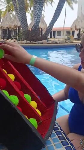 Poolside games and relaxation at Venezuelan tropical resort