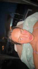 Woman enjoys late-night dining and beach drinks in Acapulco
