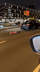 Car tows American flag through Moscow streets