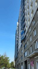 Window washers service apartment building in Vsevolozhsk, Russia