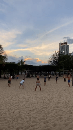 Dusk beach volleyball and twilight scenes along Nha Trang's waterfront