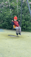Child plays, dog rests in quiet Khimki afternoon