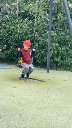 Child plays, dog rests in quiet Khimki afternoon