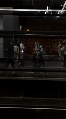 Evening commuters navigate modern Moscow transit station