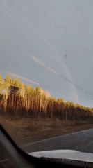Driver records scenic landscape view from vehicle in Chaikovsky