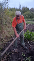 Garden work in Vereya at dusk, telecom tower in the background
