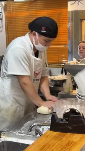 Chef hand-pulls noodles during lunch service at Kyoto restaurant