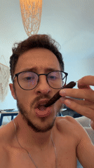 Man eating dark red food in decorated Cyprus home
