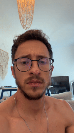 Man eating dark red food in decorated Cyprus home