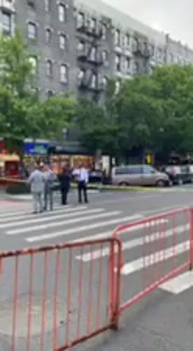 Red barriers block NYC crosswalk during street work