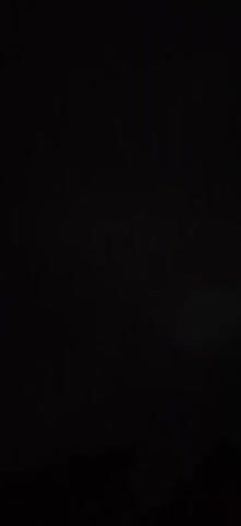 A black screen transitions to a dark, cloudy sky. A flash of lightning briefly illuminates the clouds before returning to blackness. The video ends with a brief flash of lightning against the dark sky.