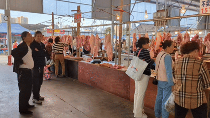 Late-night activity recorded at busy indoor meat market stall