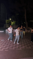 Nighttime outdoor dance performance in Isola delle Femmine