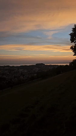 Sunset over St. Gallen from a hilltop vantage point