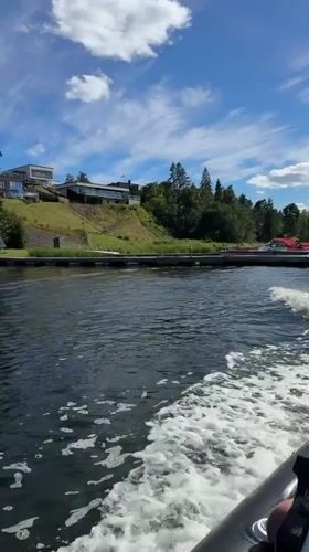 Inflatable boat cruising through Oslo fjord waters