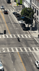 Aerial views of a busy Los Angeles street block