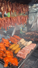 Street food vendors serve local cuisine in Baan Lamai