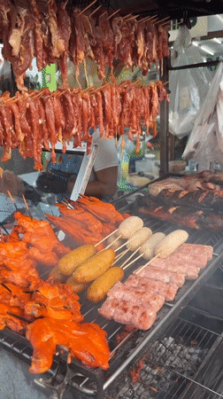 Street food vendors serve local cuisine in Baan Lamai
