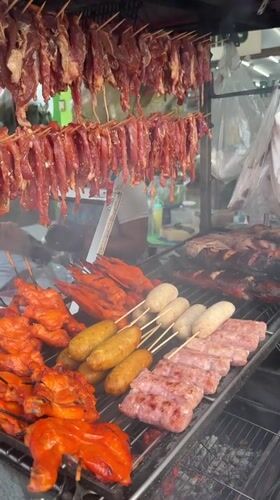 Street food vendors serve local cuisine in Baan Lamai