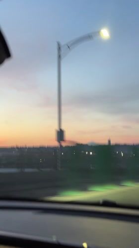 Sunset captured from moving vehicle in New Westminster