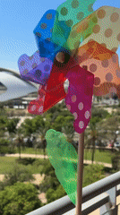 Colorful pinwheel spins in breeze in València, Spain