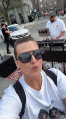 Couple enjoys afternoon cinema and street entertainment in Novosibirsk