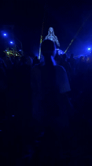 Night festival crowd gathers around giant reflective statue in Montenegro