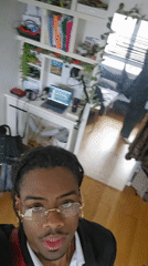 Young man records selfie video in Pantin, France