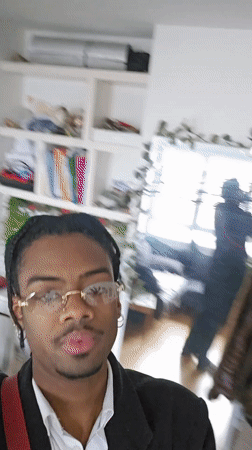 Young man records selfie video in Pantin, France