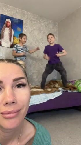 Children play and dance in Abakan home