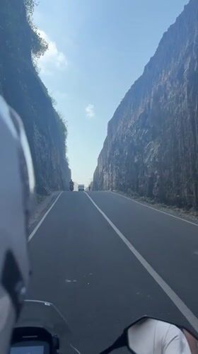 Riding Bali's coastal cliff road in Kuta Selatan