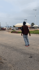 Afternoon street life and nature details in Kuson, Nigeria