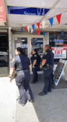 Routine NYPD presence observed on busy NYC street corner