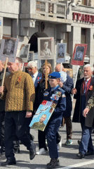 Memorial parade with photographs held in Saint Petersburg streets