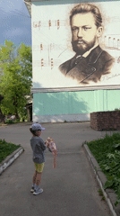 Child with backpack observed on sidewalk in Klin