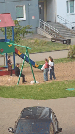 Kids at play in a Minsk residential neighborhood, summer afternoon