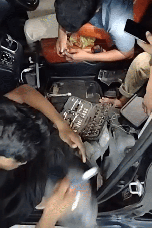 Car stripped and rewired inside a Dhaka workshop