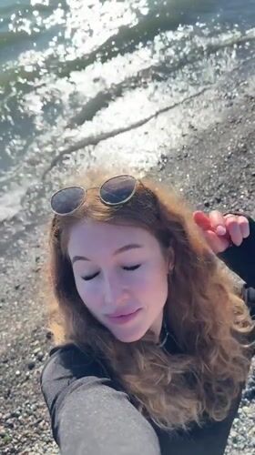 Woman spends afternoon on Chabkwara beach in Abkhazia
