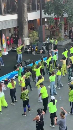 Kuta morning: aerobics in the plaza, coffee culture on the street