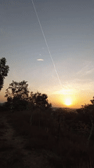 Sunset views from a Lhokseumawe hillside overlooking the coast